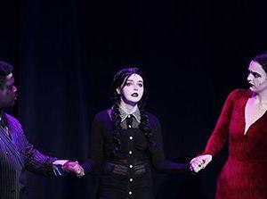 From left to right, Samantha Atchison as Morticia, Chloe Price as Wednesday, Chrisnel Akele as Gomez in the dress rehearsal for the production of 